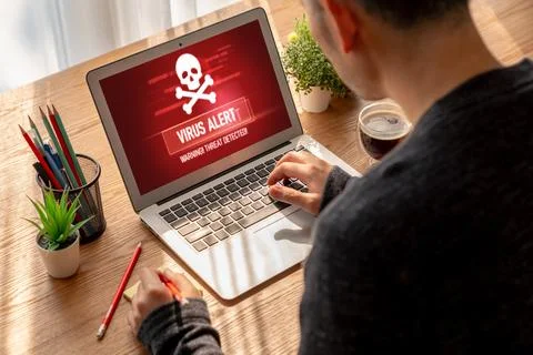 Virus warning alert on computer screen detected modish cyber threat Stock Photos