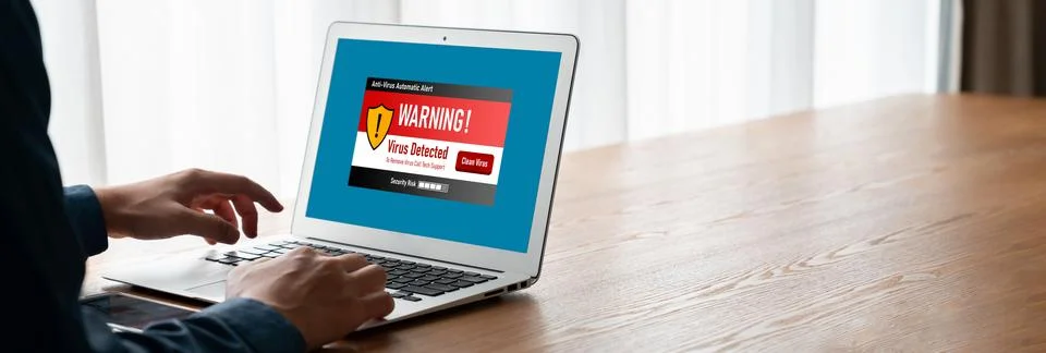Virus warning alert on computer screen detected modish cyber threat Stock Photos