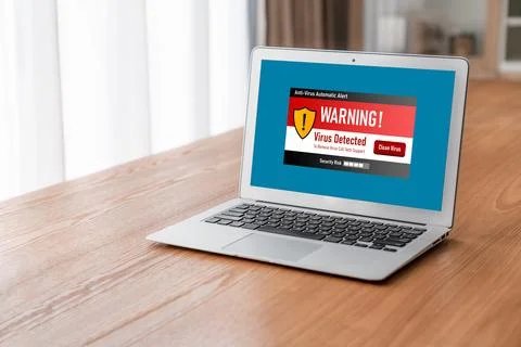 Virus warning alert on computer screen detected modish cyber threat Stock Photos