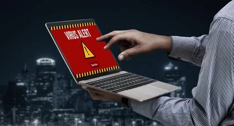 Virus warning alert on computer screen detected modish cyber threat Stock Photos