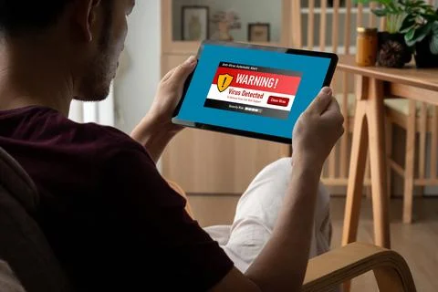 Virus warning alert on computer screen detected modish cyber threat Stock Photos