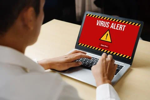 Virus warning alert on computer screen detected modish cyber threat Stock Photos