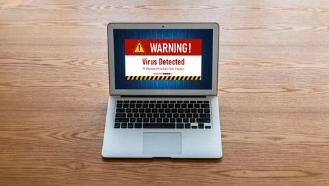 Virus warning alert on computer screen detected modish cyber threat Stock Photos