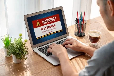 Virus warning alert on computer screen detected modish cyber threat Stock Photos