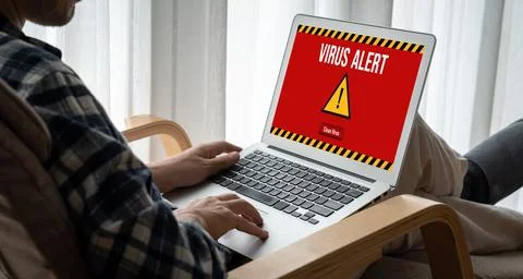 Virus warning alert on computer screen detected modish cyber threat Stock Photos