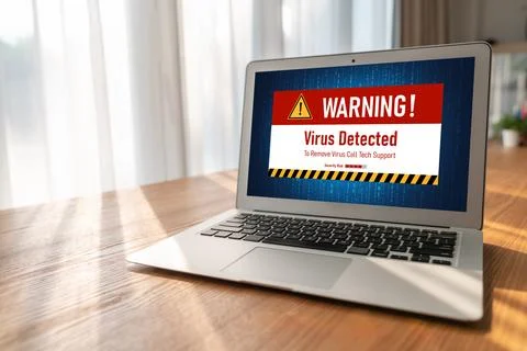 Virus warning alert on computer screen detected modish cyber threat Stock Photos
