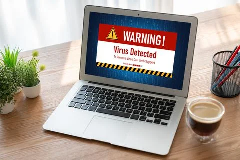Virus warning alert on computer screen detected modish cyber threat Stock Photos