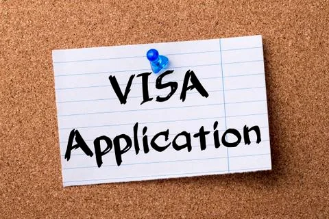 VISA Application - teared note paper pinned on bulletin board Stock Photos