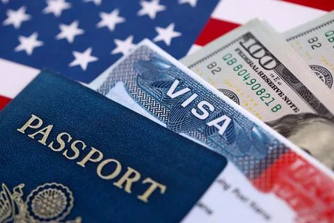 VISA on a background of U.S. flag and US dollars. travel or immigration concept Stock Photos