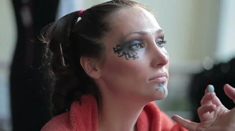 Visagiste makes makeup for  model, professional makeup artist , makeup, body art Stock Footage 46223059