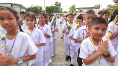 Visaka Bucha day. Students hold flower sacrifice. Buddhist temple in bangkok Stock Footage 63574632