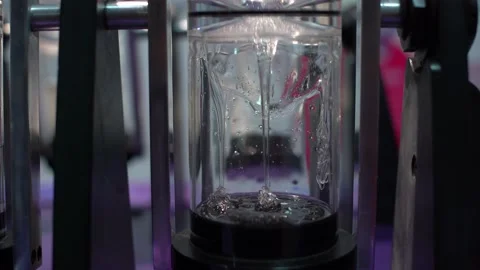 A viscous liquid flows. Silver fluid viscous fluid Stock Footage 148121813