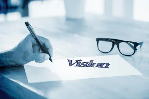 Vision  against side view of hand writing on white page on working desk Stock Illustration