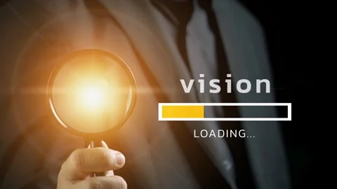 Vision is loading with a business man is holding a magnifying glass in his hand. Stock Footage 266957807