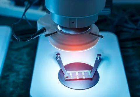 Vision measuring instrument inspecting PCB circuit board Stock Photos