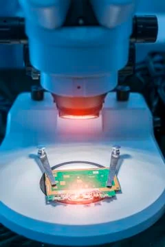 Vision measuring instrument inspecting PCB circuit board Stock Photos