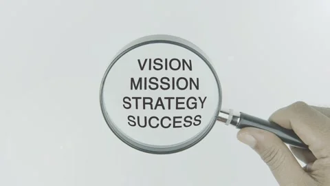 Vision Mission Strategy Success text or word highlighted by a magnifying Stock Footage 303733092