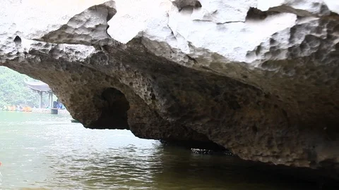 Visit the cave by boat Stock Footage 91364675