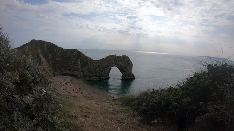 Visit Durdle Door, during COVID-19 pandemic, 2020. Timelapse over Durdle Door Stock Footage 144138629