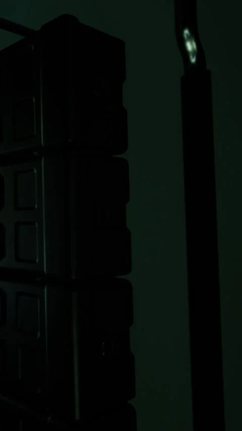 Visit to an old warehouse showing tools and equipment in shadow Stock Footage 337971268