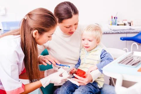 Visiting a dentist Stock Photos