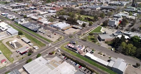 Visitor centre and Robertson park in Orange city – aerial down flying as 4k. Stock Footage 141823258