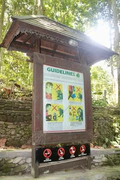Visitor Guidelines Information Board Sacred Monkey Forest  Ubud Bali Indonesia Stock Photos