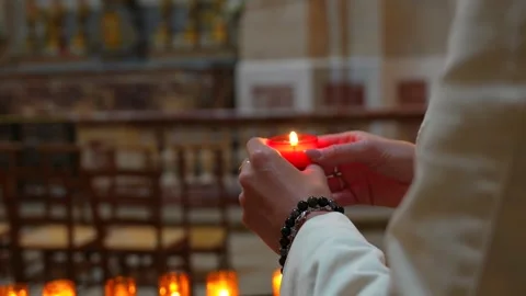 Visitor Holding Devotional Candle in Royal Chapel, Palace of Versailles Stock Footage 337053738