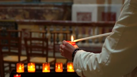 Visitor Lighting Devotional Candles in Royal Chapel, Palace of Versailles Stock Footage 337053819
