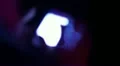 Visitor of night club is using his or her touch screen phone HD Footage