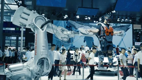 A visitor is testing Nissan Virtual Augmented Reality Simulator Wearing Stock Footage 109474444