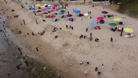 Visitor Tourism Activities at the Beach Stock Footage 244648301