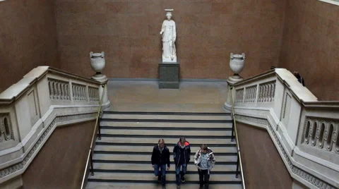 Visitor walk down the steps at a museum in London Stock Footage 50363696