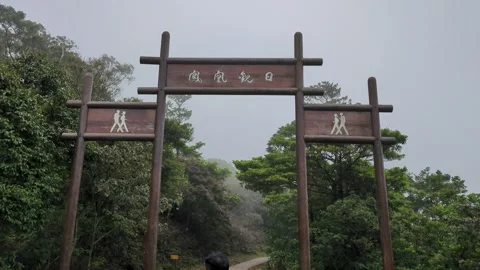 Visitor walking to Shek Pik Trail entrance. HongKong, China-2ndApril 2024 Stock Footage 271235868