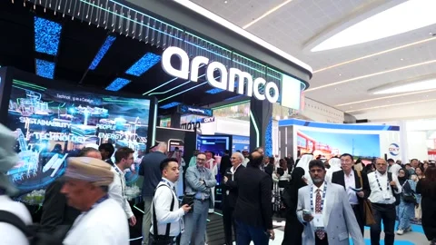 Visitors and atendees moving around ADIPEC 2025 Stock Footage 321046116