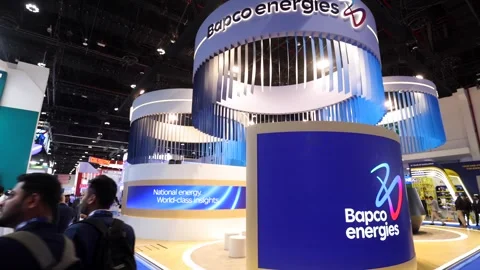 Visitors and atendees moving around ADIPEC 2025 Stock Footage 321046815