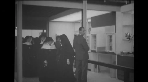 Visitors and group of nuns visiting  Brussels World's Fair Stock Footage 37595088