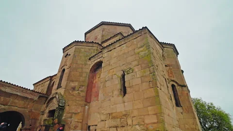Visitors at the arched gateway of Jvari Monastery 動画素材 347140882