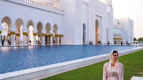 Visitors are seen touring the Sheikh Zayed Grand Mosque in Abu Dhabi 動画素材 321463255