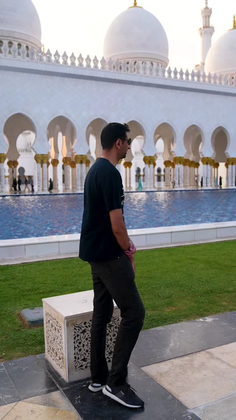 Visitors are seen touring the Sheikh Zayed Grand Mosque in Abu Dhabi 動画素材 321463315