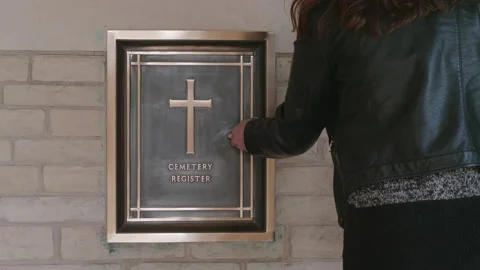 Visitors book read at WW2 Commonwealth war graves cemetery, Normandy. 4K tripod Stock Footage 141270328