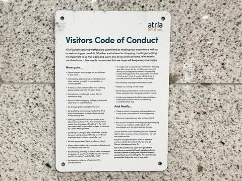 Visitors code of conduct displayed on a wall in public place Stock Photos