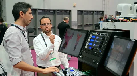 Visitors communicate during NAB Show exhibition in Las Vegas, USA. Stock Footage 60715557