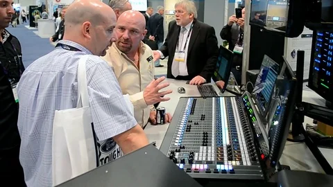 Visitors communicate during NAB Show 2016 exhibition in Las Vegas, USA. 스톡 동영상 72907640