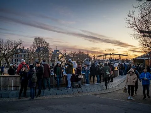 Visitors congregate at a public courtyard Stock Photos