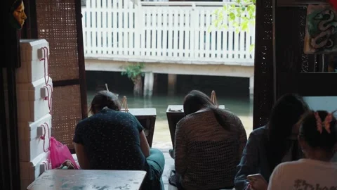 Visitors doing craft activities The Artist’s House Baan Silapin Bangkok Thailand Stock-Footage 330483335