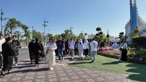 Visitors Dressed in Black Queuing Outside the Entrance of Wat Phra Kaew Bangkok Stock Footage 333220502