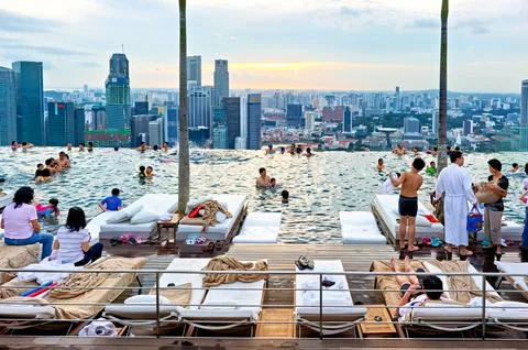 Visitors enjoy Infinity Pool at Marina Bay Sands in Singapore Stock Photos
