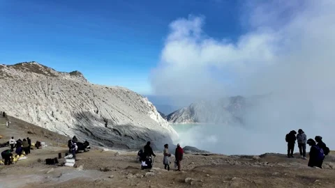 Visitors Enjoy Panoramic Scenery At Mount Ijen Crater Stock Footage 345198959