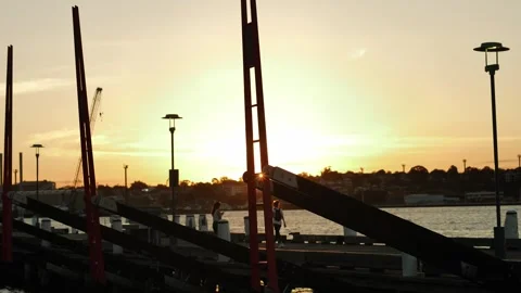 Visitors enjoy Sydney harbour at sunset 4K Stock Footage 269853733